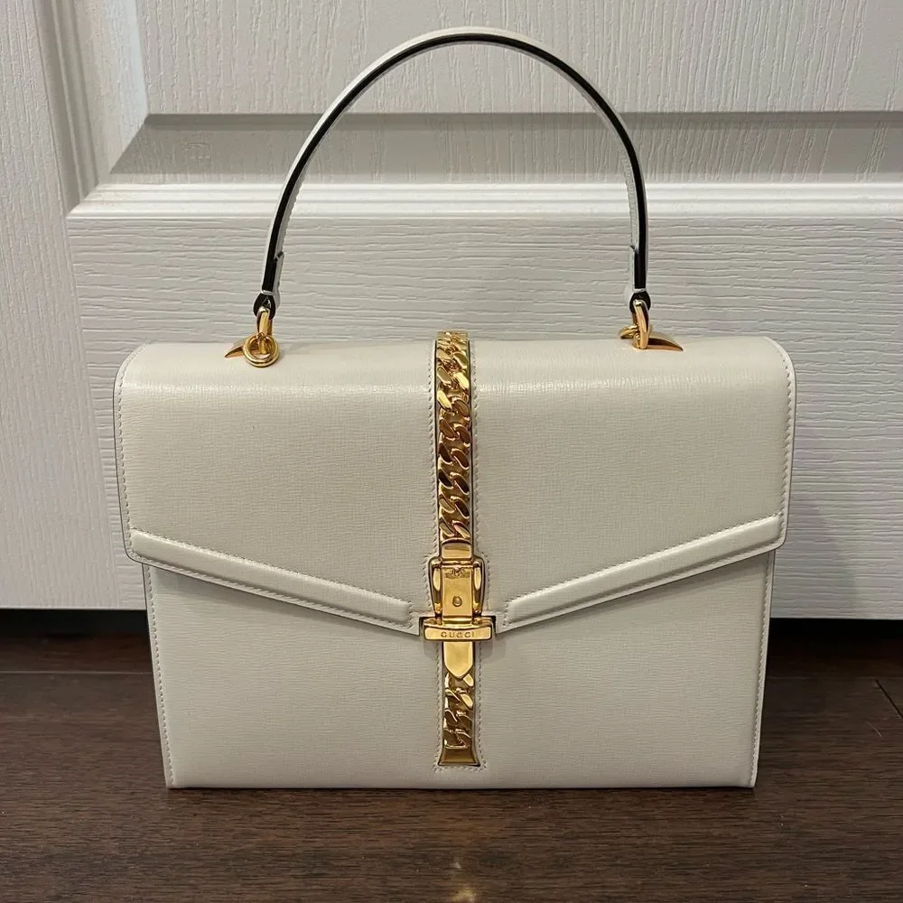- Used once Gucci Sylvie 1969 small leather shoulder bag